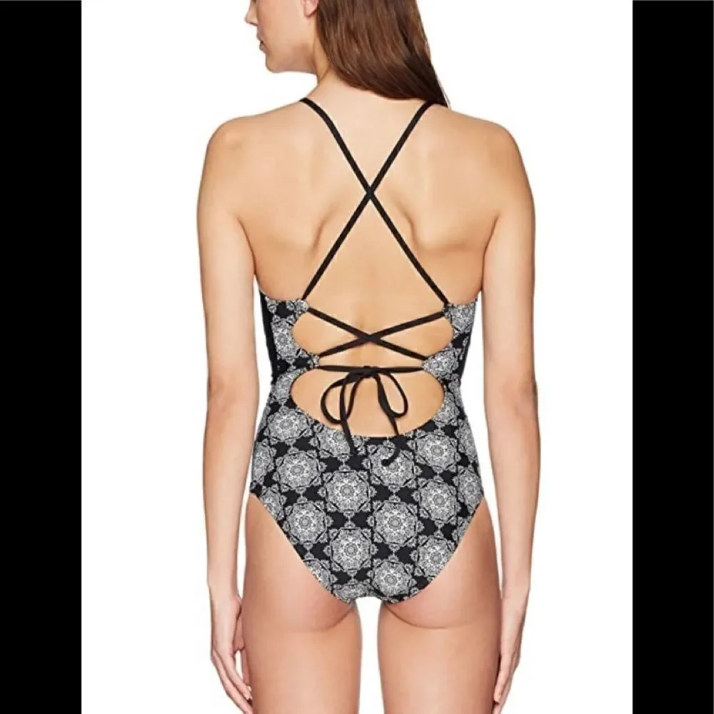 Medallion print plunge swimsuit. RUNS SMALL. NWOT